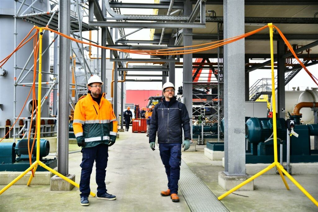 Cable bridge and stand suspending cables above a work area